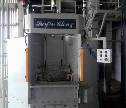 CONTINUOUS TABLE SHOT PEENING MACHINE